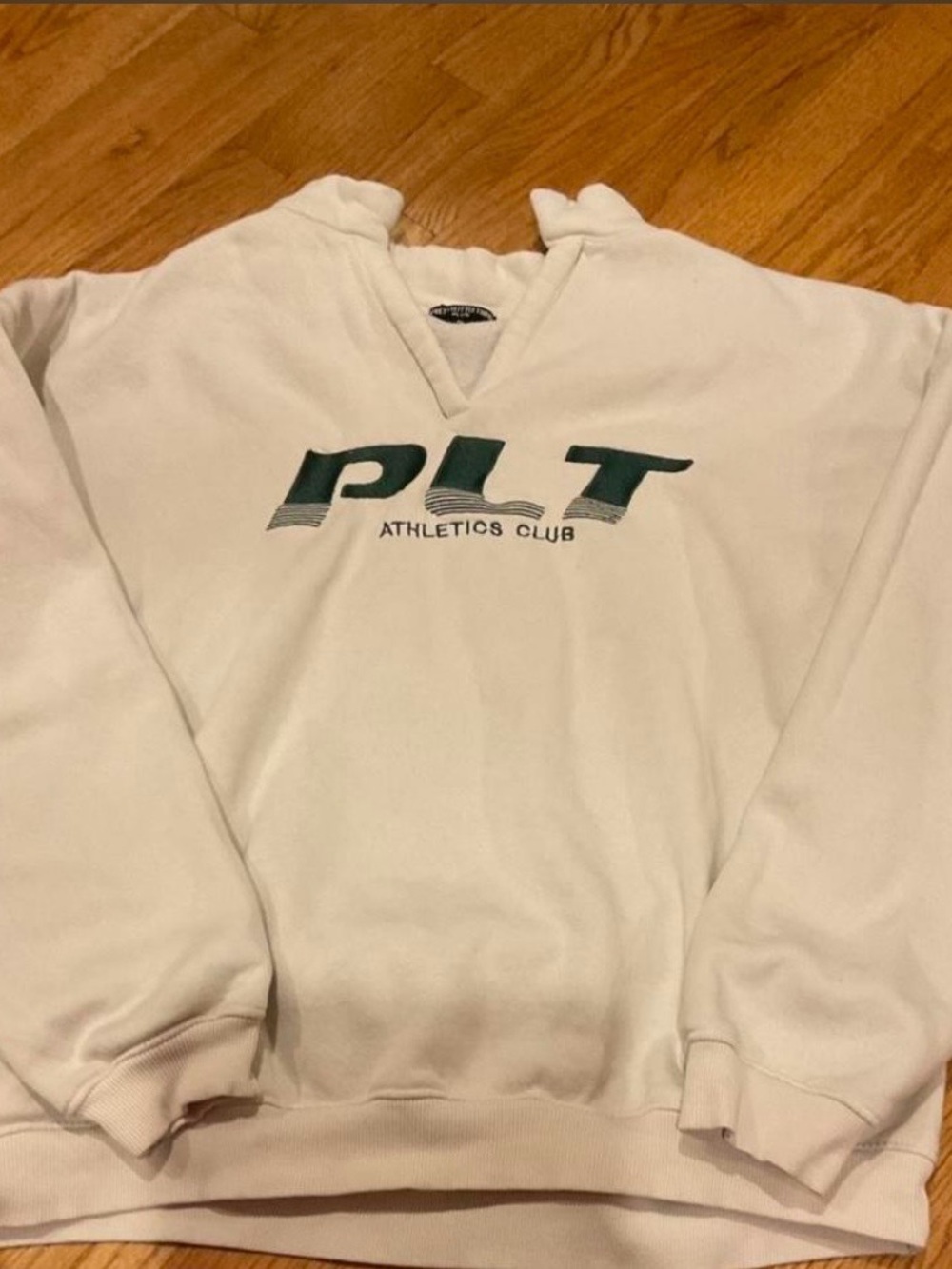 PrettyLittleThing White V-Neck Sweatshirt with Green Logo
